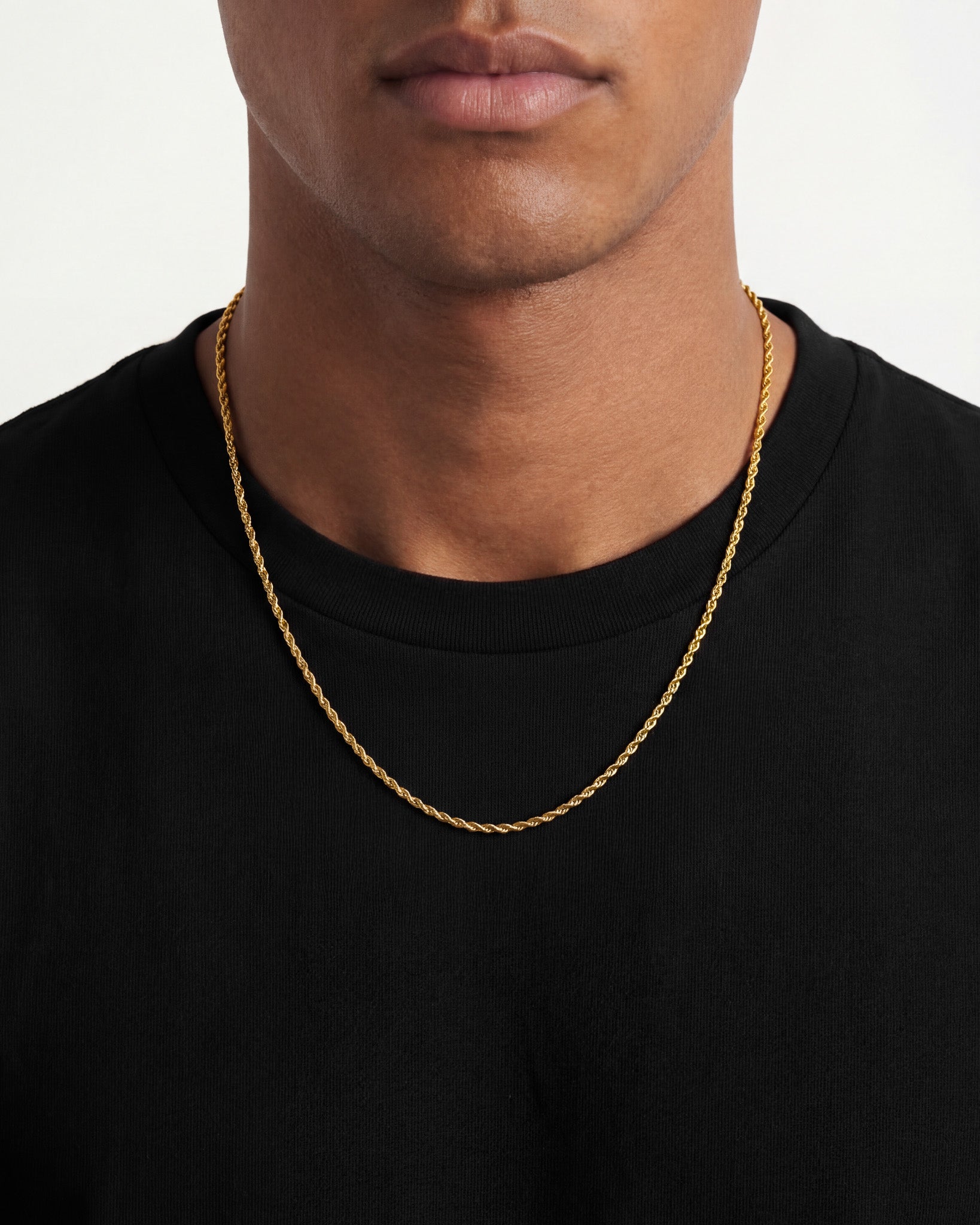Model wearing Lazio Gold Chain refined rope chain around the neck 3 mm wide