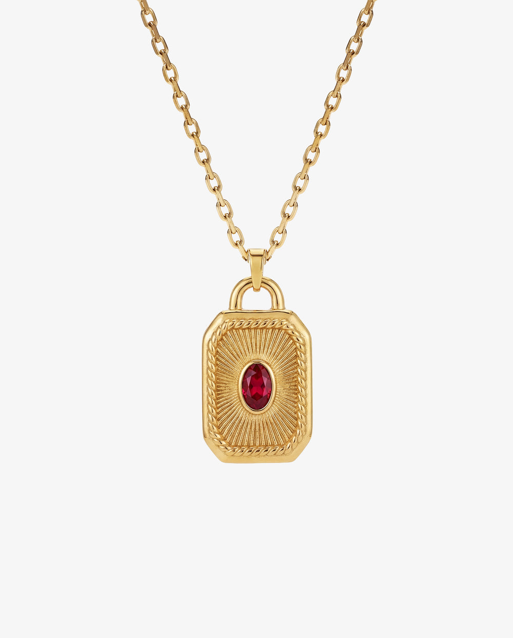Gold chain necklace with an ornate pendant set with a red gemstone