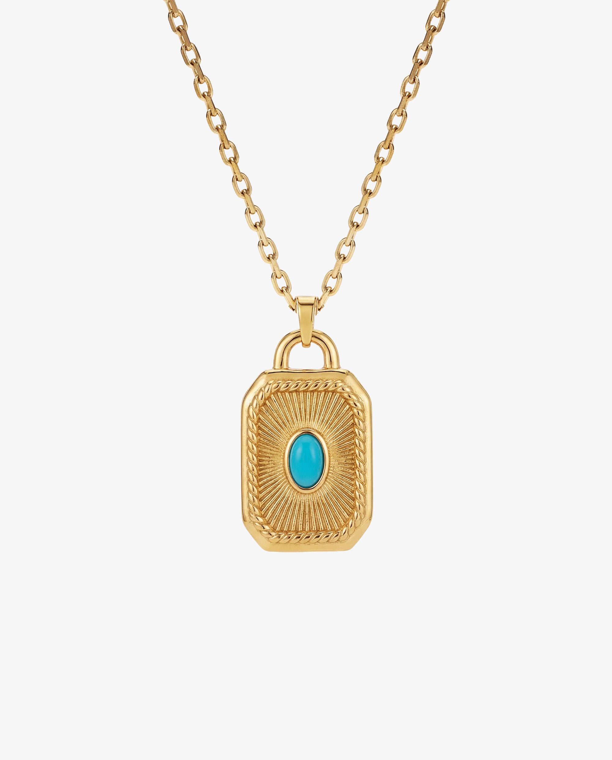Gold AETHER necklace with an ornate rectangular pendant and a turquoise blue gemstone center.