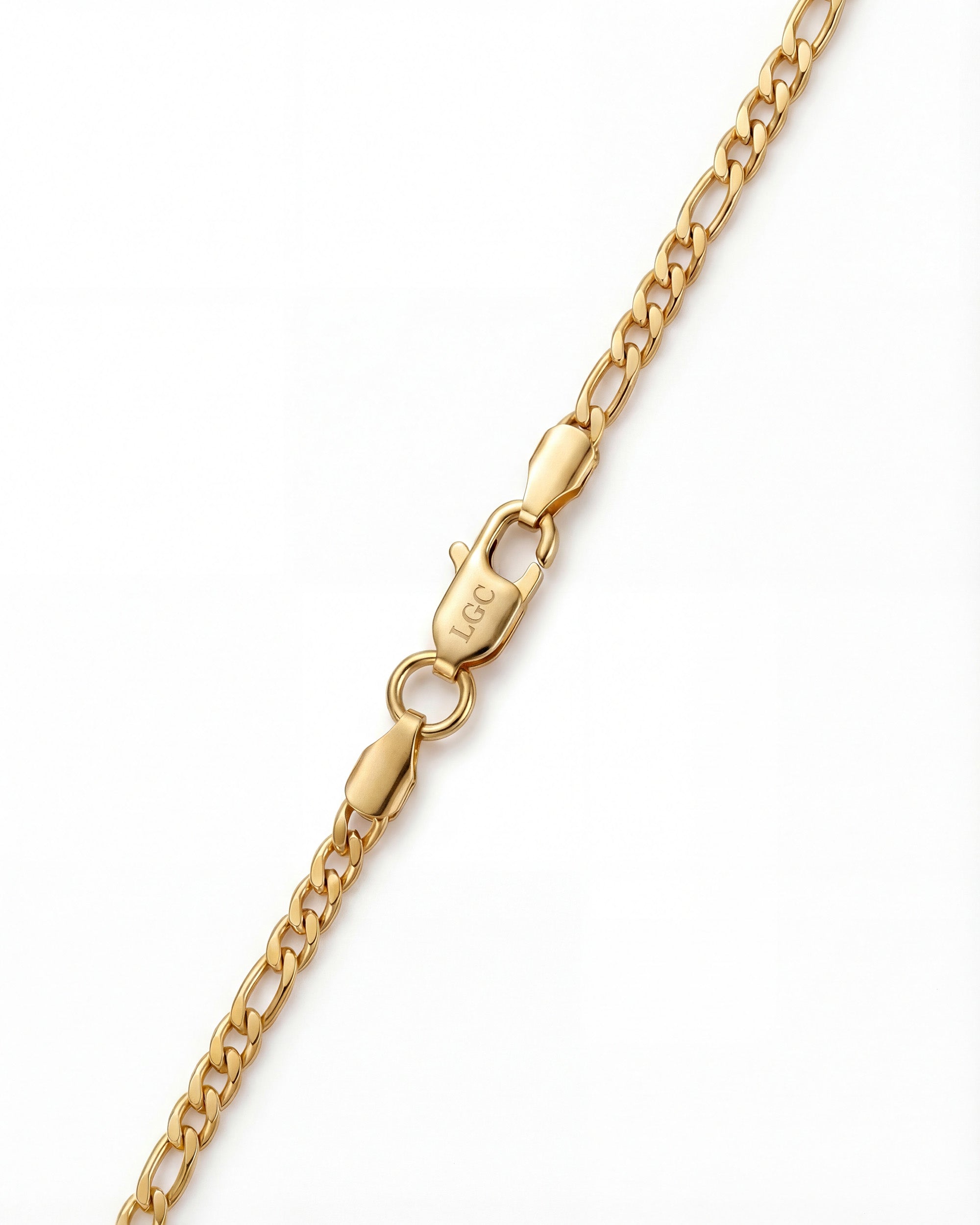 Close-up of Amalfi Gold Chain with lobster clasp and LGC engraving on a white background