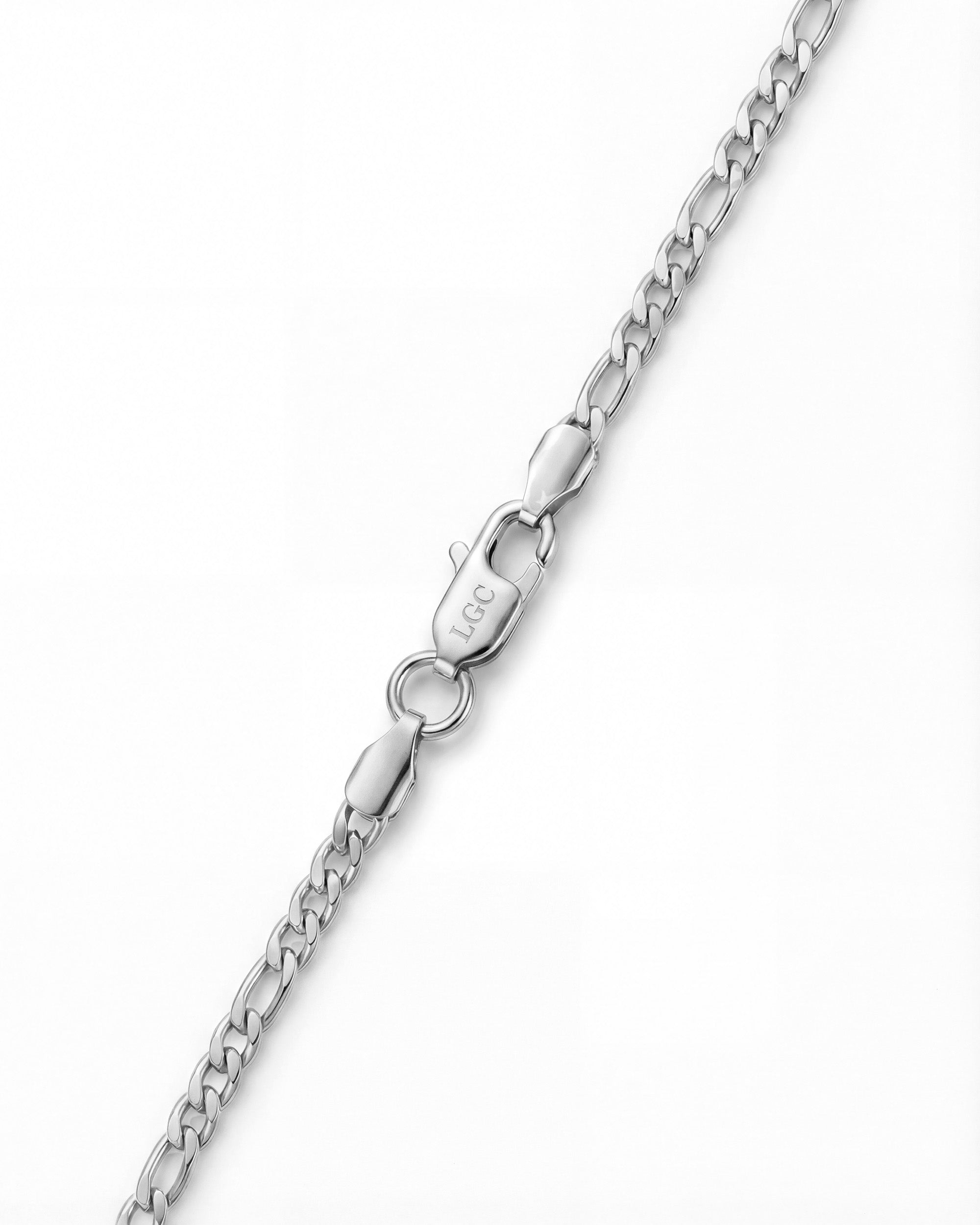 Close-up of a chunky Amalfi Silver Chain showing large oval links and a lobster clasp with an engraved logo.