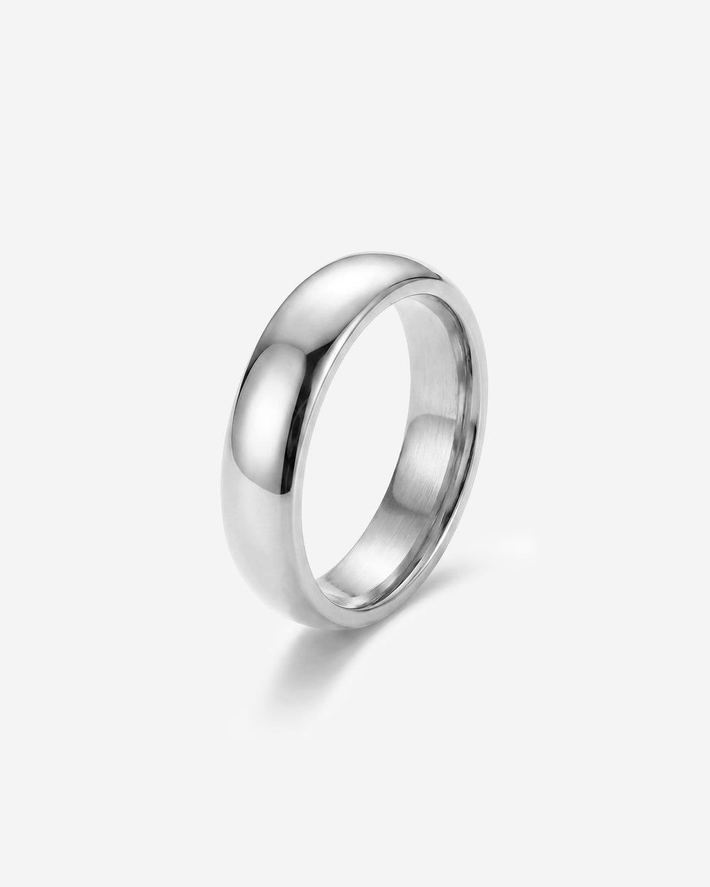 Polished wide silver band ring with a smooth surface.
