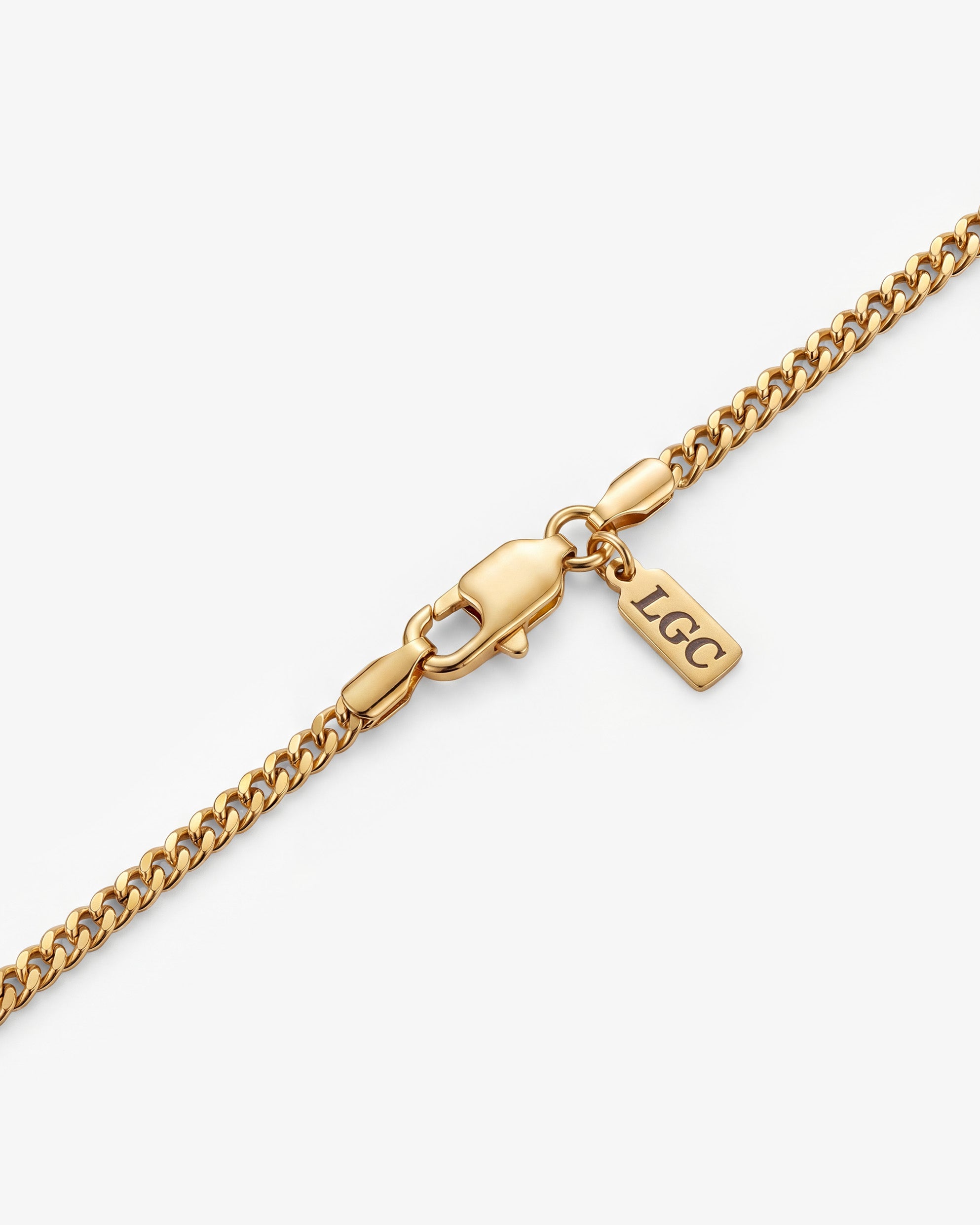 VOLT GOLD NECKLACE featuring a rectangular tiger eye pendant on a chunky gold chain