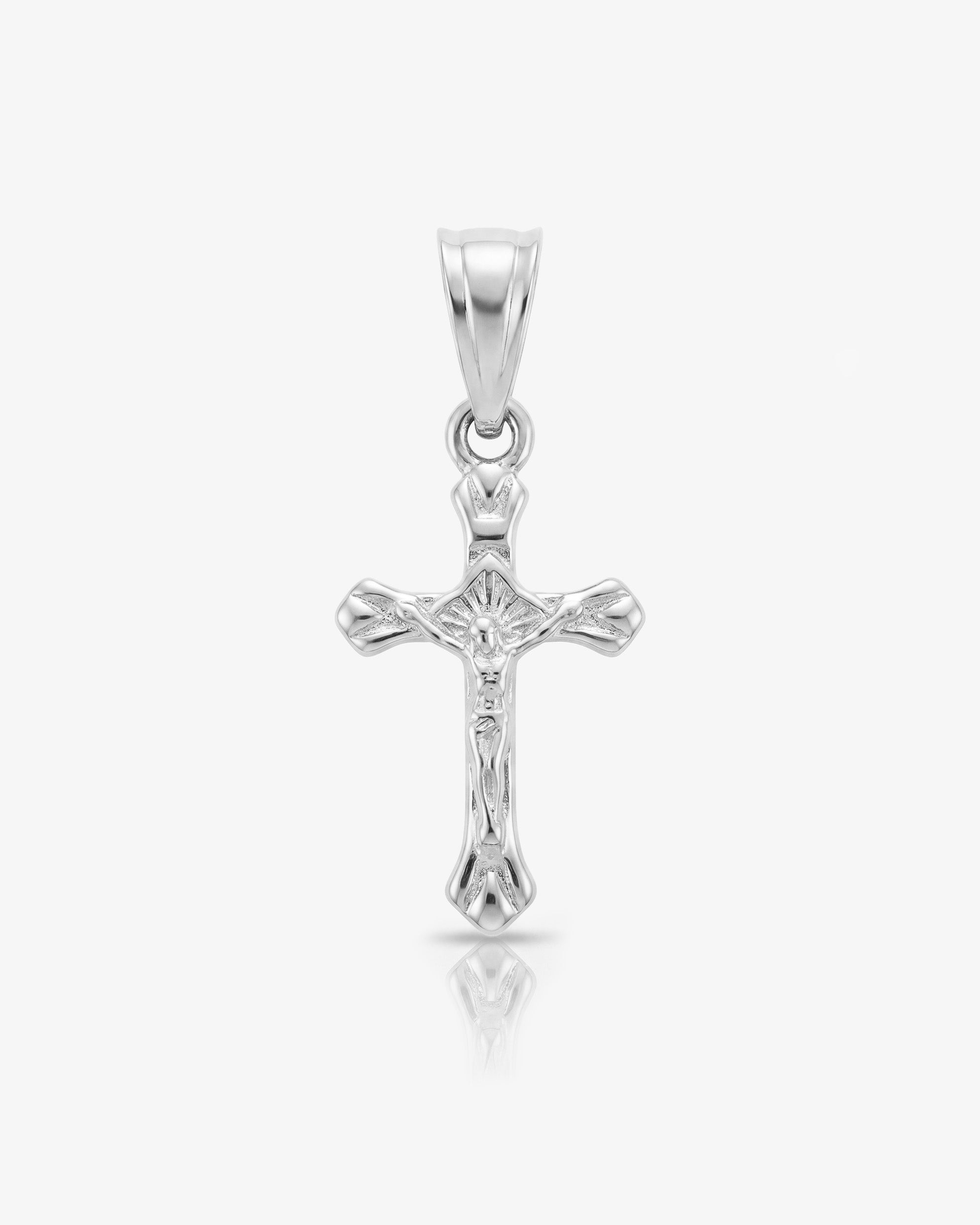 Silver mini cross charm pendant with a polished bail.