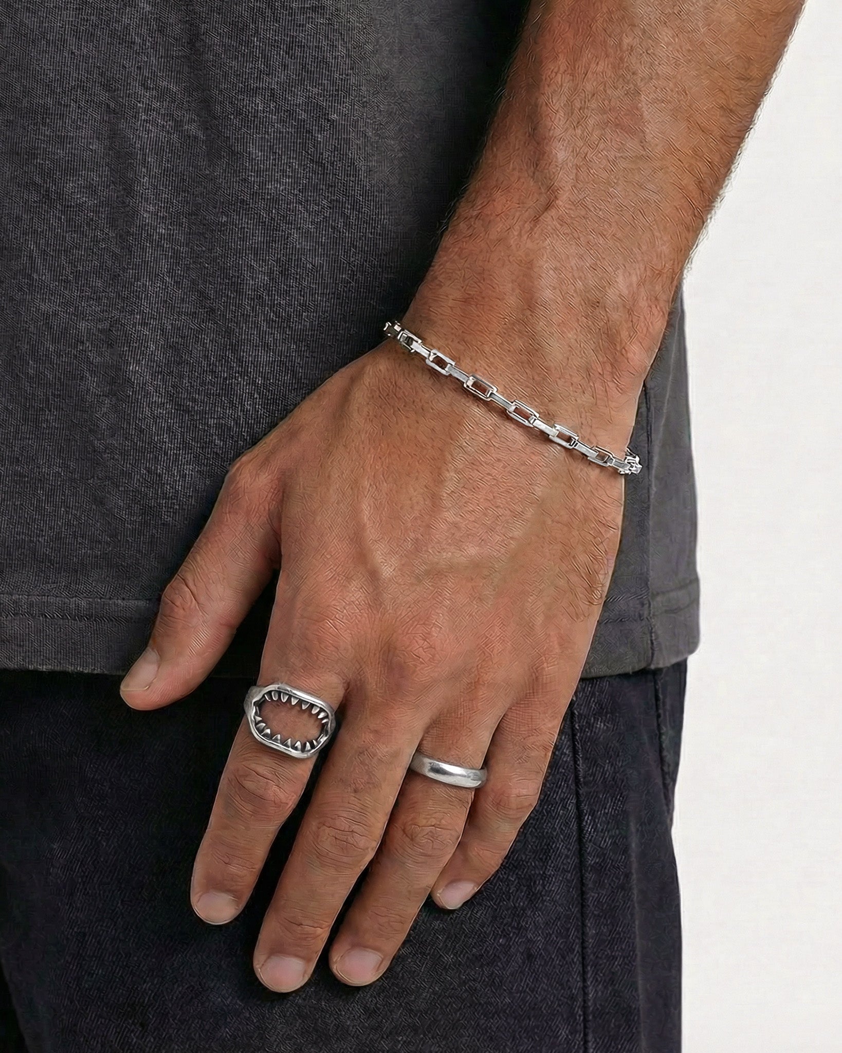 Dusky silver chain bracelet worn on the wrist