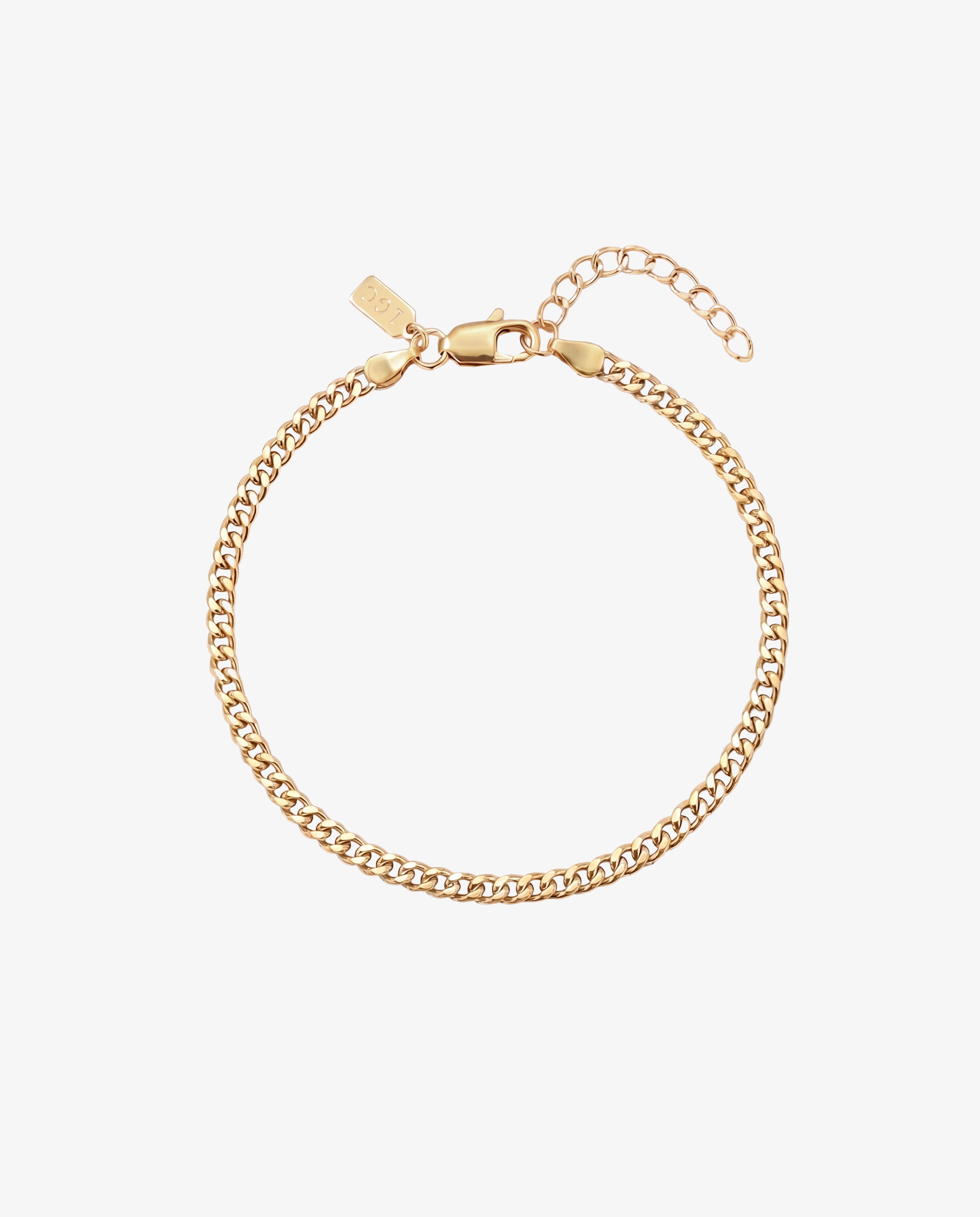 KUBU gold bracelet close-up with lobster clasp and extender chain on white background