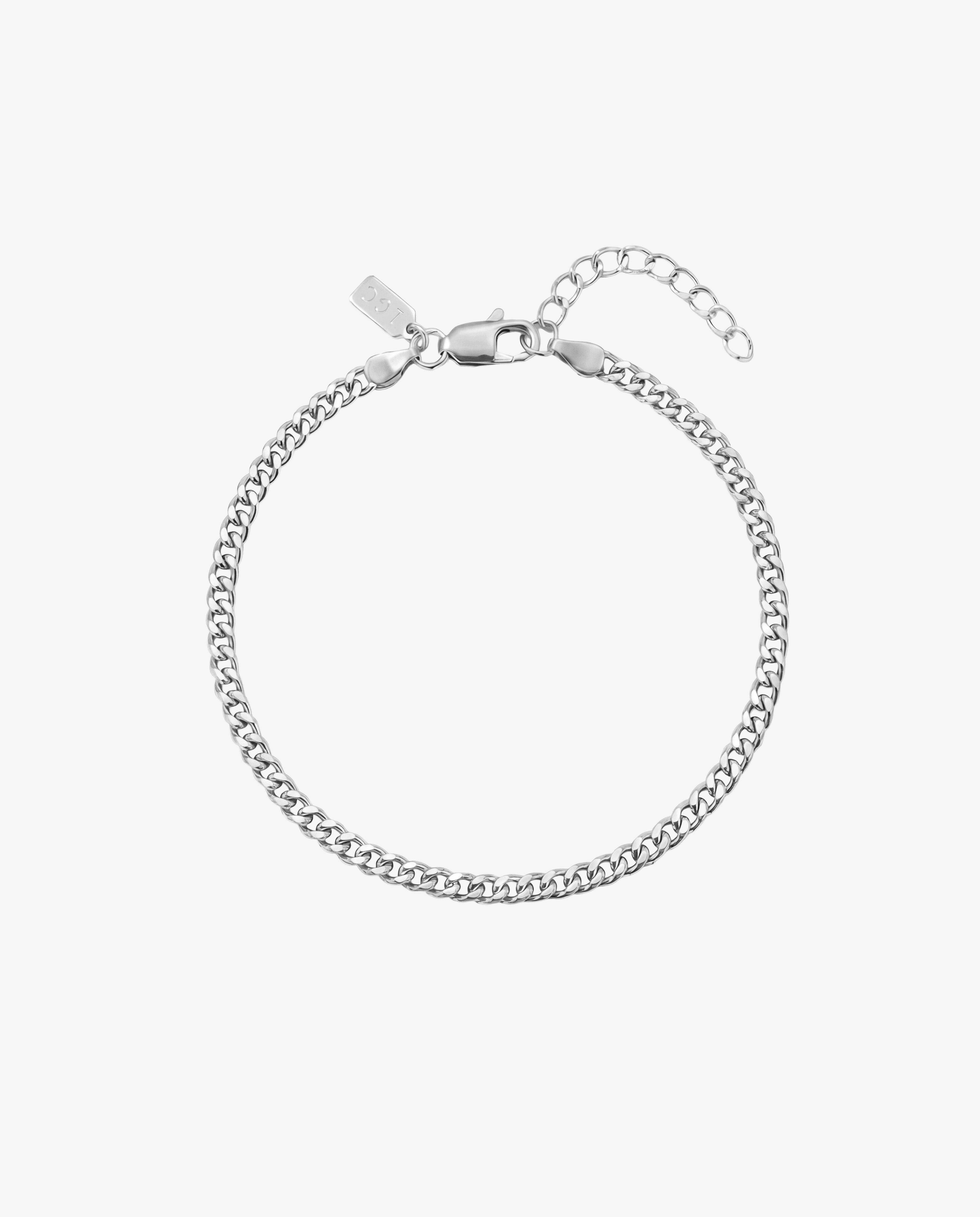 KUBU silver bracelet close-up showing lobster clasp and extender chain on white background
