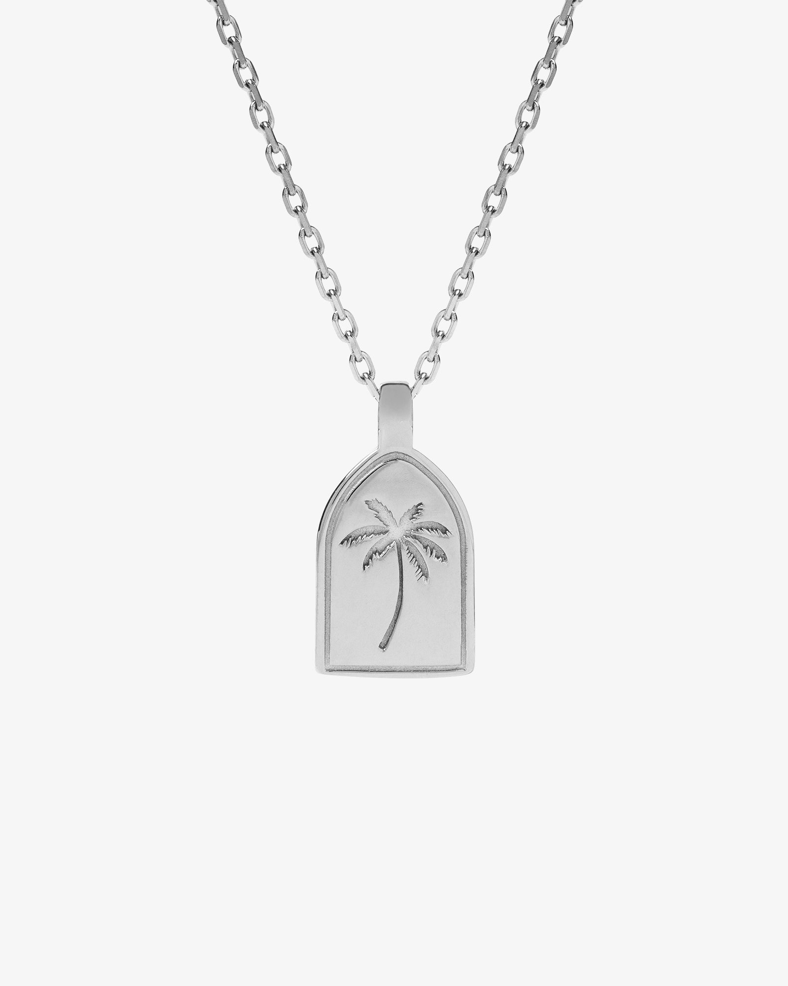 Palm Silver Necklace with a palm tree pendant on a black shirt; chain length 50 cm plus 5 cm adjustable