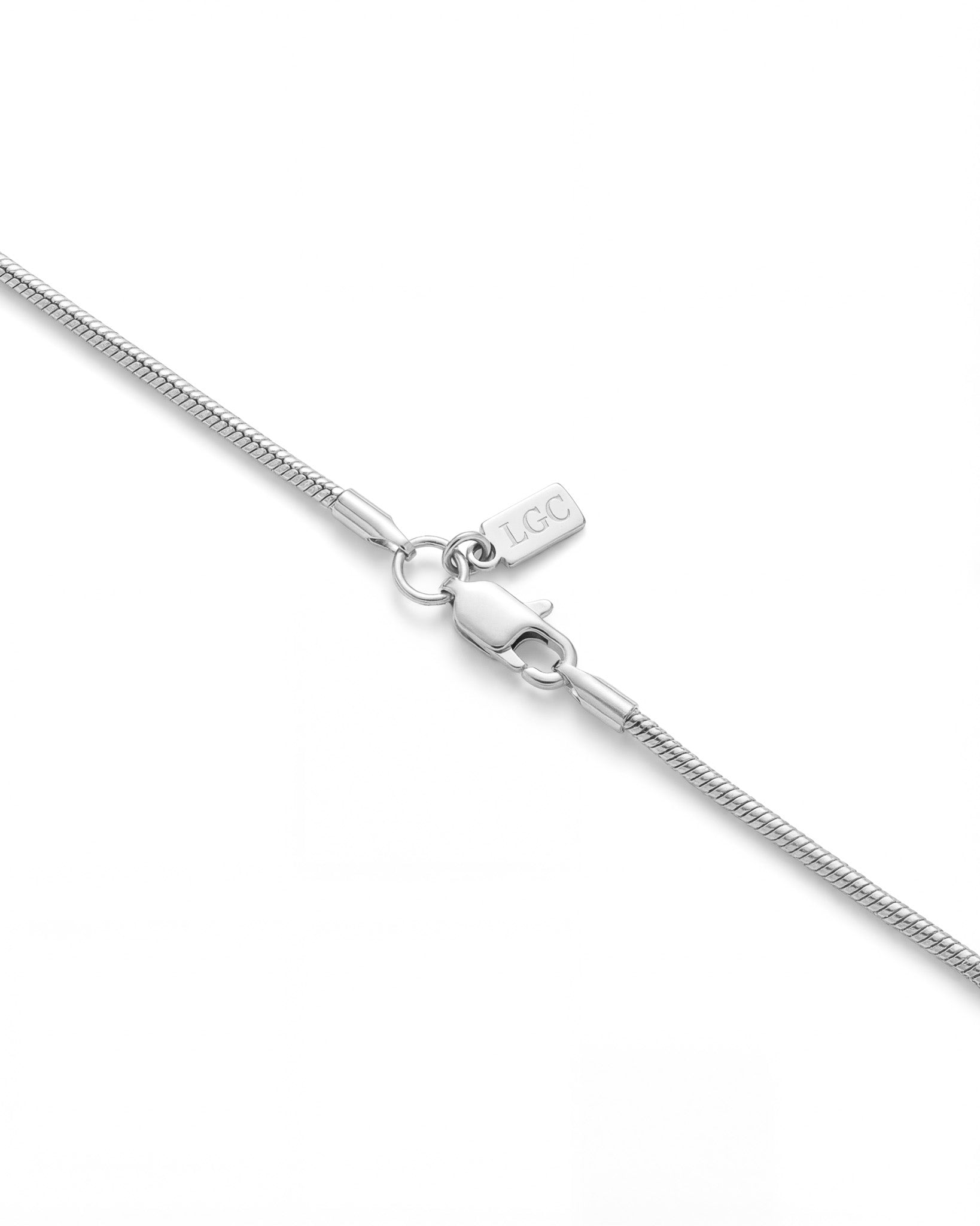 Sunset Silver Chain close up showing a 2 mm silver chain with a clasp on white background